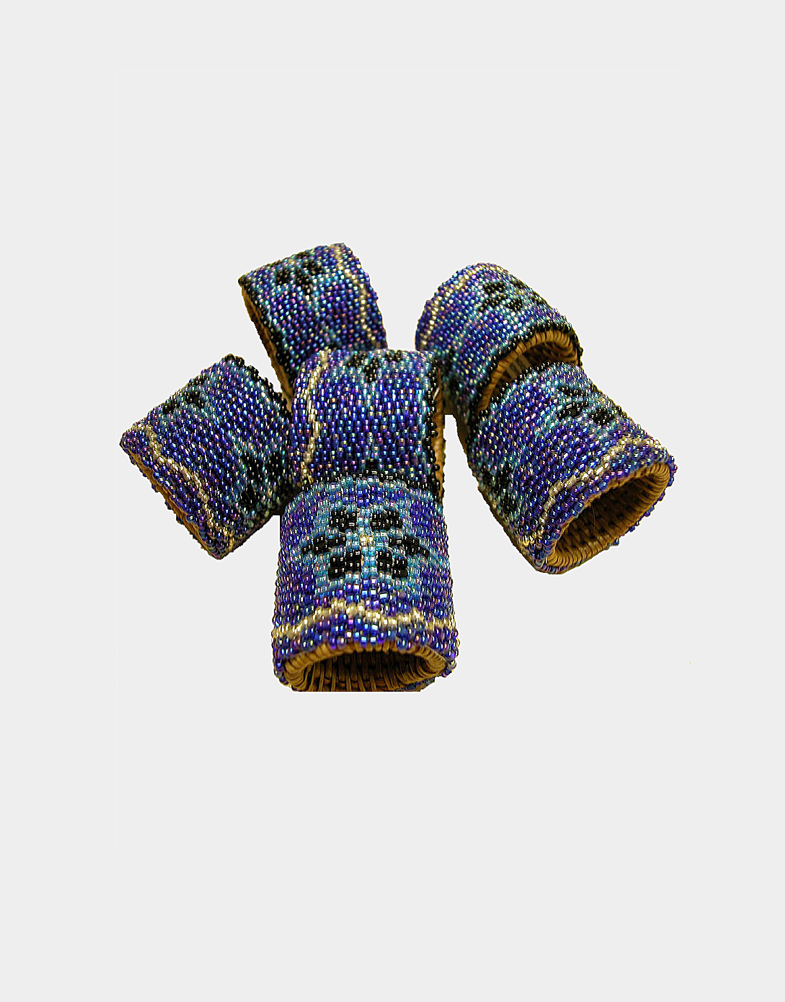 These amazing beaded napkin rings are from Bali, Indonesia - beaded over a Rattan frame. Shop Fair Trade napkin rings made by Indonesian women. Free shipping