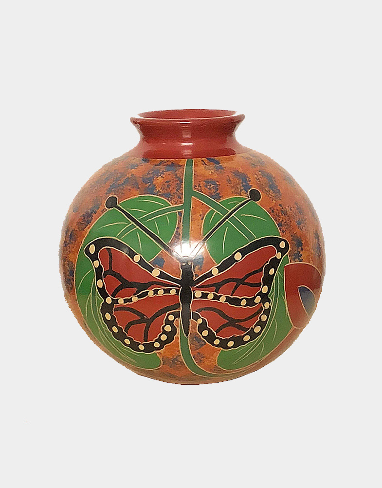 This decorative Nicaraguan pottery vase is 6 inches tall and 6 inches in diameter, featuring a monarch butterfly design. Free shipping at Craft Montaz.