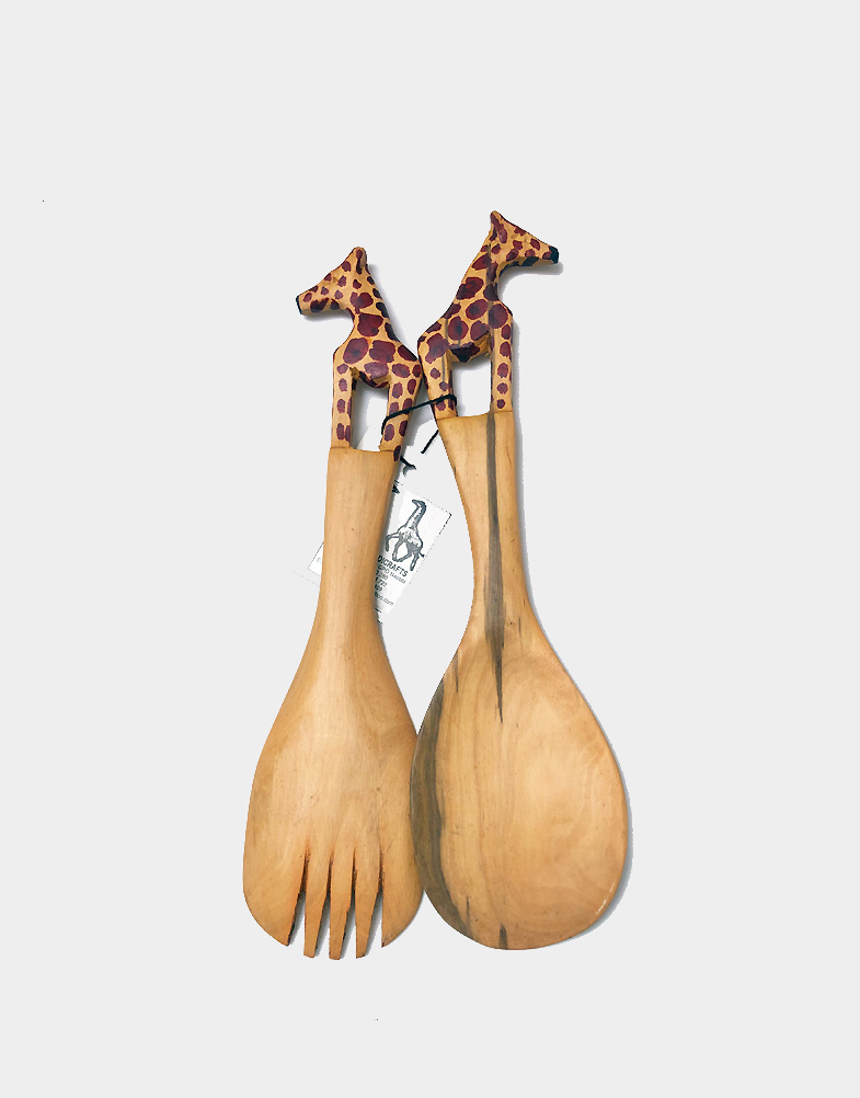 Artfully carved from a single piece of renewable Mhgu wood, this rustic pair of wooden salad serving spoon set showcases the talents of the Kenyan artisans. Shop now.