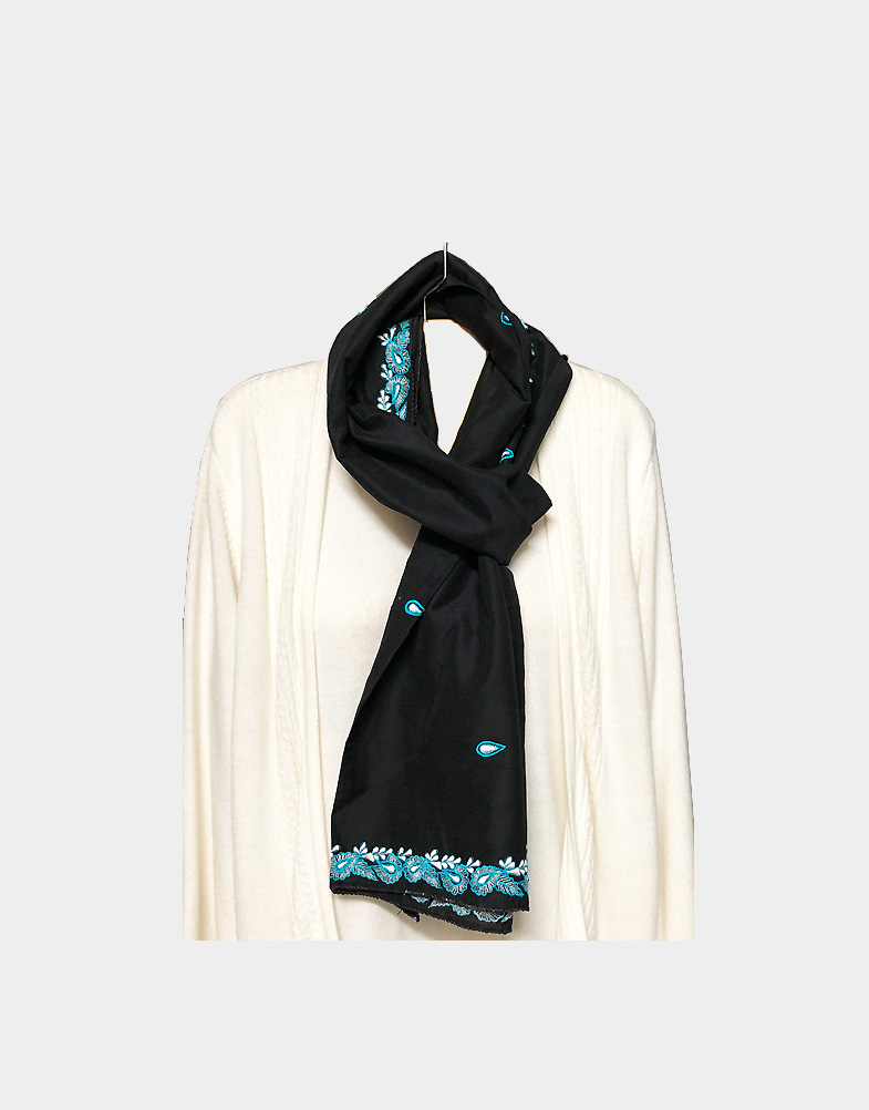 This black Khadi silk (50% cotton-50% silk blend) scarf with turquoise blue machine embroidered border is exquisitely soft and lightweight. Free shipping.