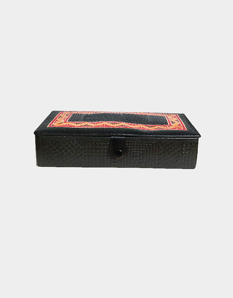 These are rectangular jewelry boxes with padded top cover with embossed Indian design on textured black leather jewelry box with mirror inside. Button to close.