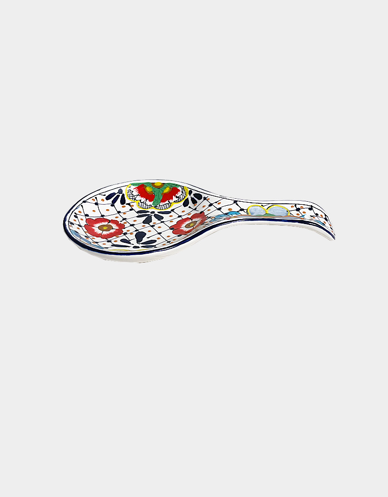 This Ceramic Spoon Rest from Mexico doubles as a functional spoon holder or decorative wall display; a small hole on the handle makes hanging easy. Free Shipping.