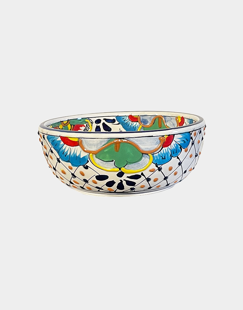 These ceramic pottery bowls are made by artisans in Mexico. Each piece is highly textured, gorgeous, yet very functional. Lead-free, microwave and dishwasher safe.