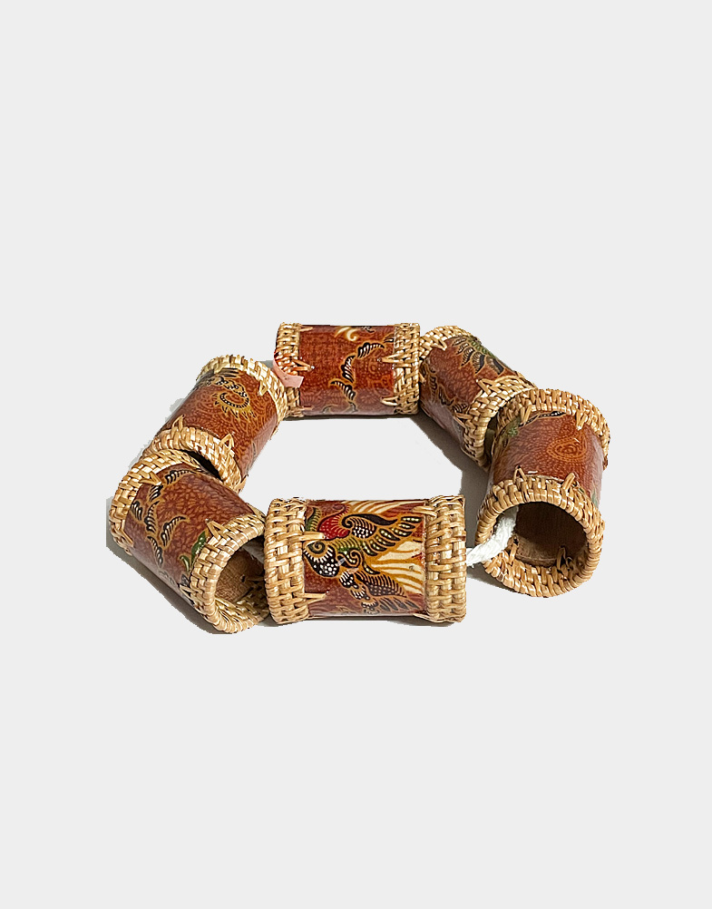 Indonesian women make these napkin rings by hand, wrapping cotton & weaving ate grass fibers in the traditional Lombok style around bamboo stalks. Shop now.