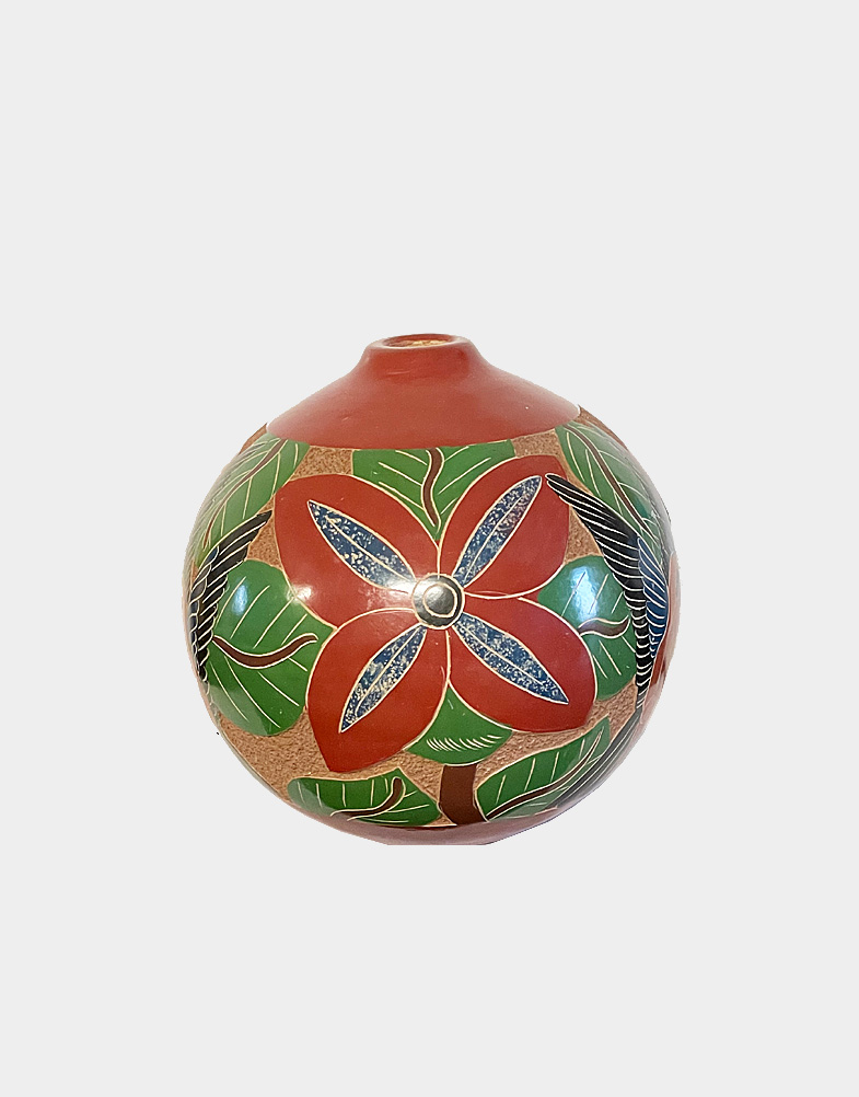 This hand painted pottery vase from Nicaragua featuring a colorful flower and bird design is ideal for your home decoration. Free shipping at Craft Montaz.