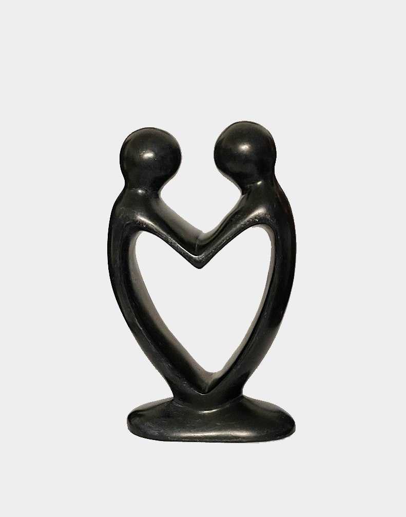 Hand-carved and hand painted, a lustrous black finish Kisii soapstone sculpture by African artisans, depicts the sweet love of a couple holding hands. Free shipping!