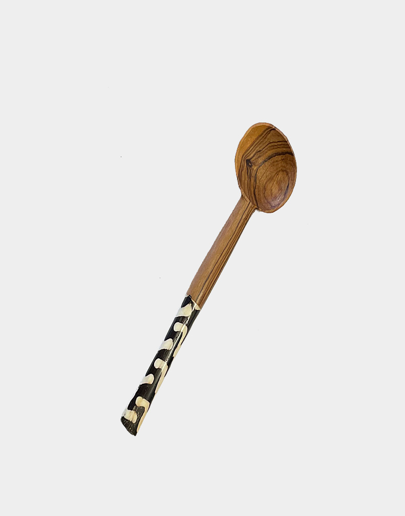Beautifully hand crafted from wild olive wood and dyed cow bone by artisans in Kenya, this useful sugar spoon adds an interesting touch to your dinnerware. Buy now.