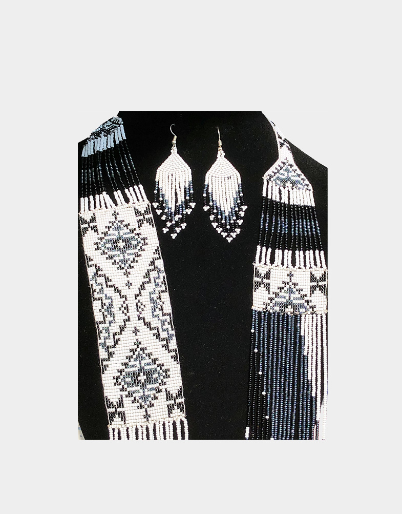 This fashionable necklace set is made with black and white seed beads, woven in intricate geometric lace pattern. The set is made in Nagaland, India. Unique set.