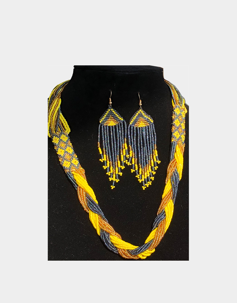 This unique necklace set is made by Kuki tribe women of Nagaland, India with yellow, grey, and mustard colored seed beads, woven in intricate geometric designs.