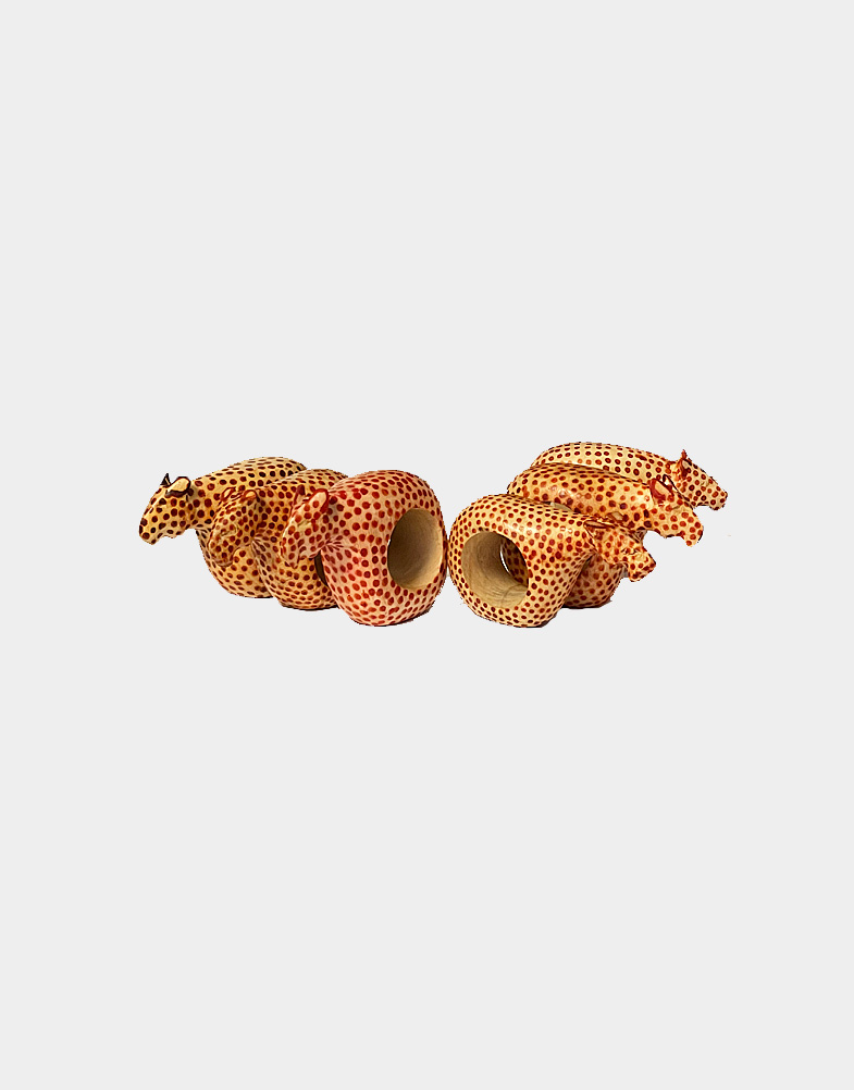 Add a unique look to your dinner table with this set of six handmade safari animal cheetah napkin rings by Kenyan artisan with African mahogany wood. Shop now.