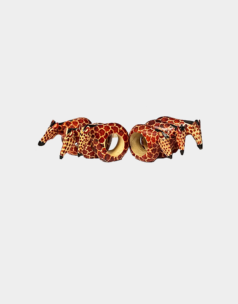 This set of six giraffe napkin rings is carved from African Mahogany, using simple tools and traditional techniques Kenyan artisans. Free shipping!! Buy now!!