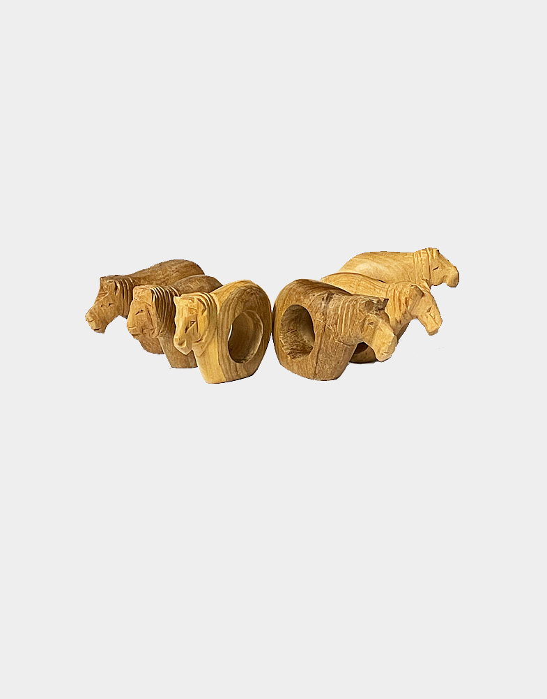 This set of six lion napkin rings is carved from African Mahogany, using simple tools and traditional techniques Kenyan artisans. Free shipping!! Buy now!!