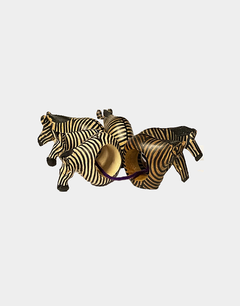 Add a unique look to your dinner table with this set of six handmade safari animal zebra napkin rings. This set is made with African mahogany wood. Free shipping!