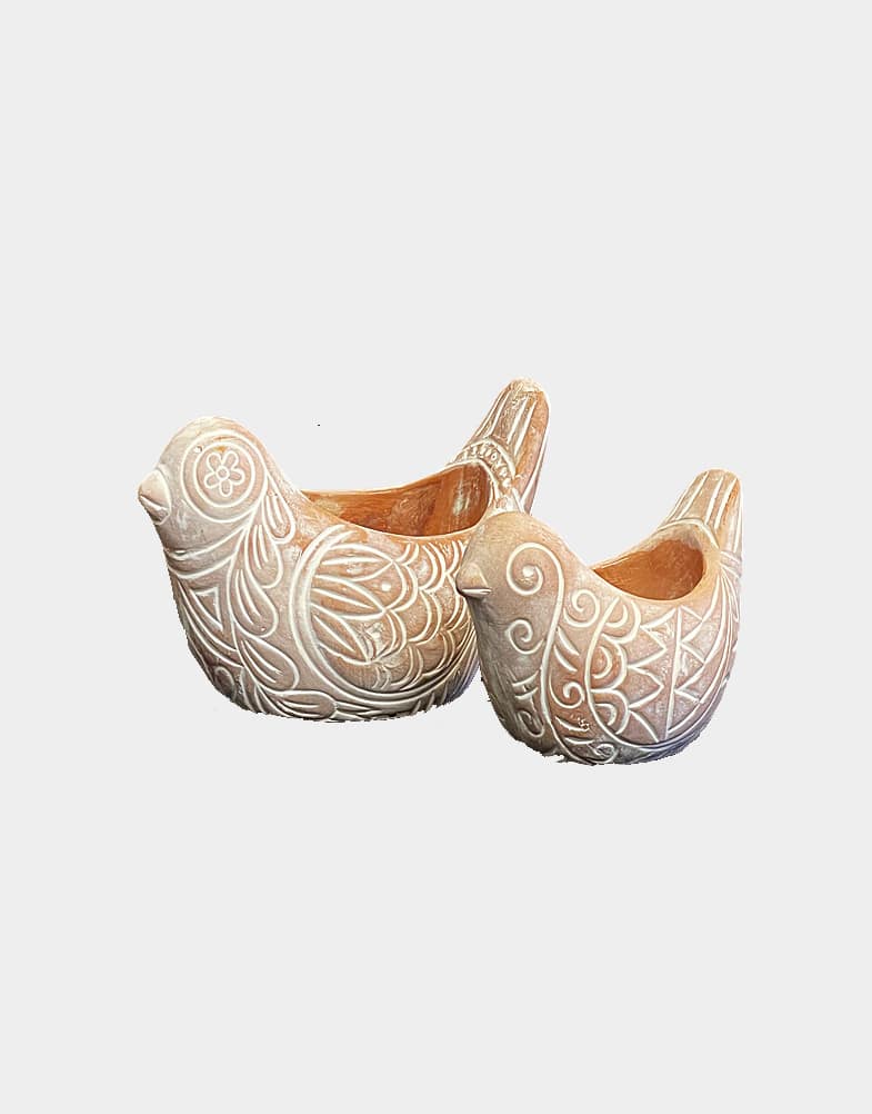 These terracotta bird planters are hand etched with traditional designs and finished with contrasting whitewash, made in Bangladesh. Buy these planters now!