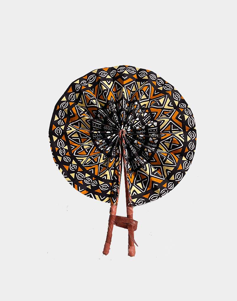 This colorful hand-fan features an elegant, traditional mud print design with leather handles - a true craftmanship from Ghana, Africa. Buy this beautiful fan!!