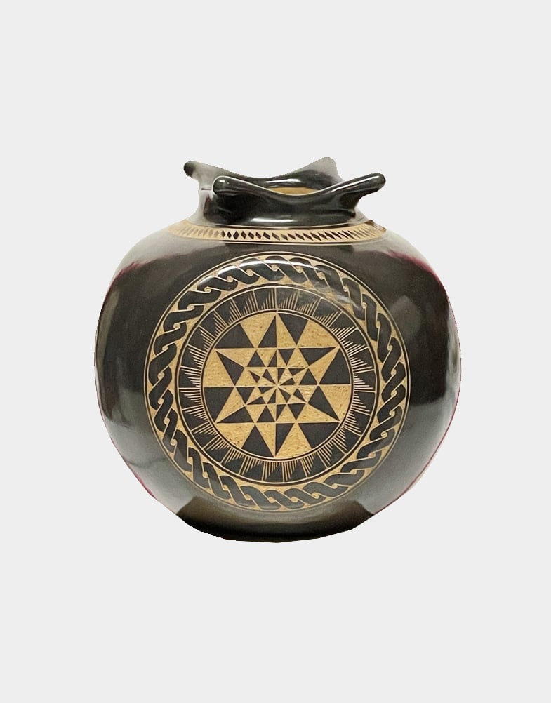 This triple sided designed terracotta pottery is distinguished by its unique innovation in original, abstract and contemporary design elements. You must own it.