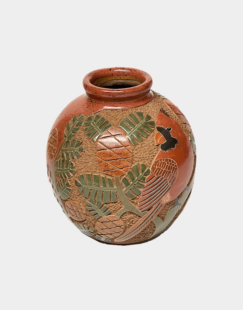 This fair trade decorative vase from Nicaragua is 6 inches tall & 6 inches in diameter, featuring a cardinal bird design, does not hold water. Signed by the artist.
