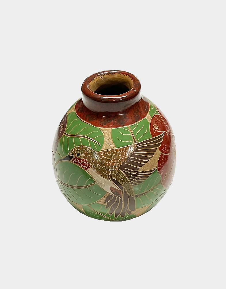 These decorative pots comes in varied motif, colors and elaborately etched patterns, one decorated with humming bird motif while the other with butterflies.