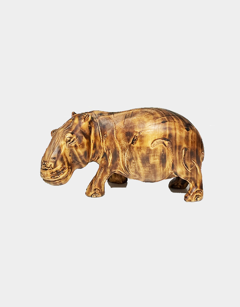Beautiful hippo sculpture from jacaranda wood, finished with burned contours. This sculpture is fully handmade, each hippo exhibits its own characteristics.