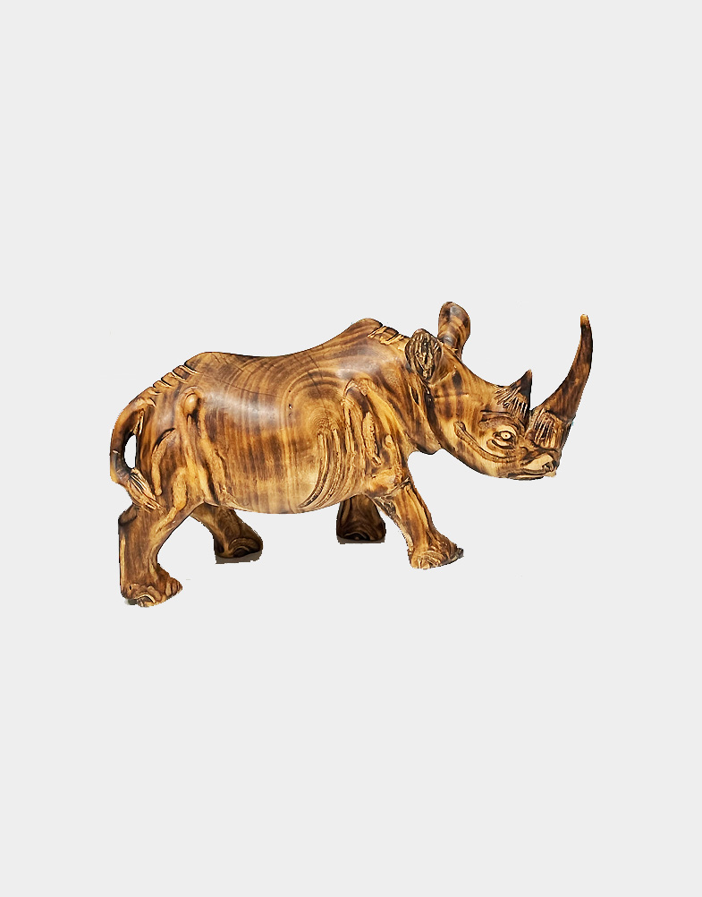 Talented Kenyan carvers carve this beautiful rhino sculpture from jacaranda wood, finished with burned contours. It is fully handmade in African country Kenya.